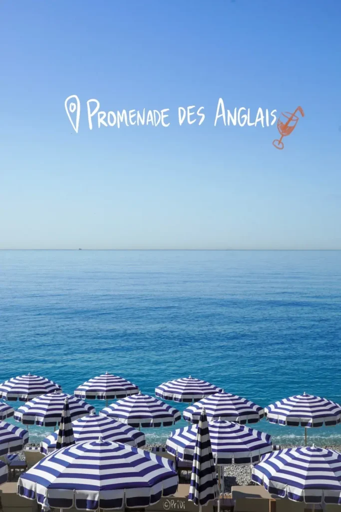 Blue beach umbrellas and blue skies at Promenade des anglais