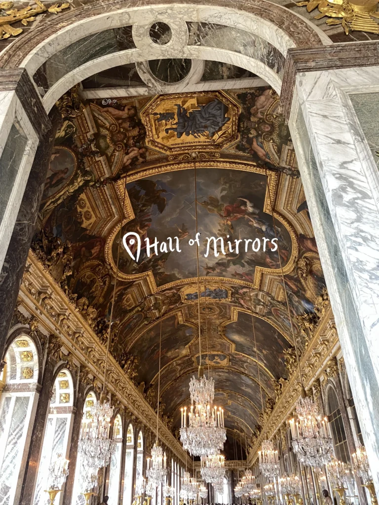 the opulently decorated hall of mirrors at the palace of versailles, with multitudes of chandeliers