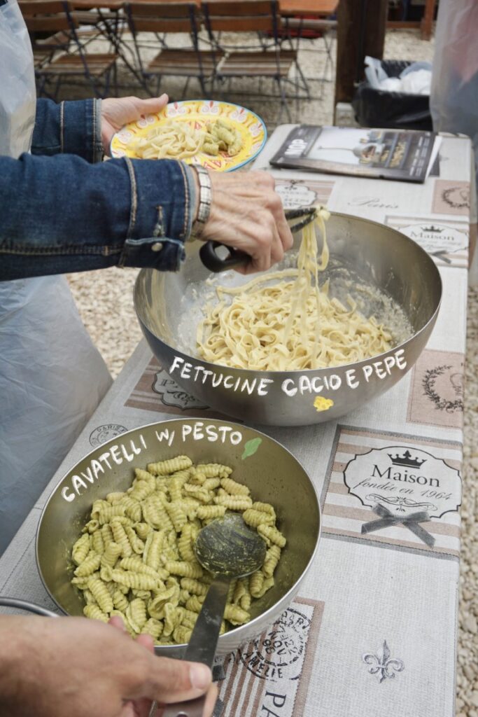 Cooked fresh fettucine and cavatelli in bowls