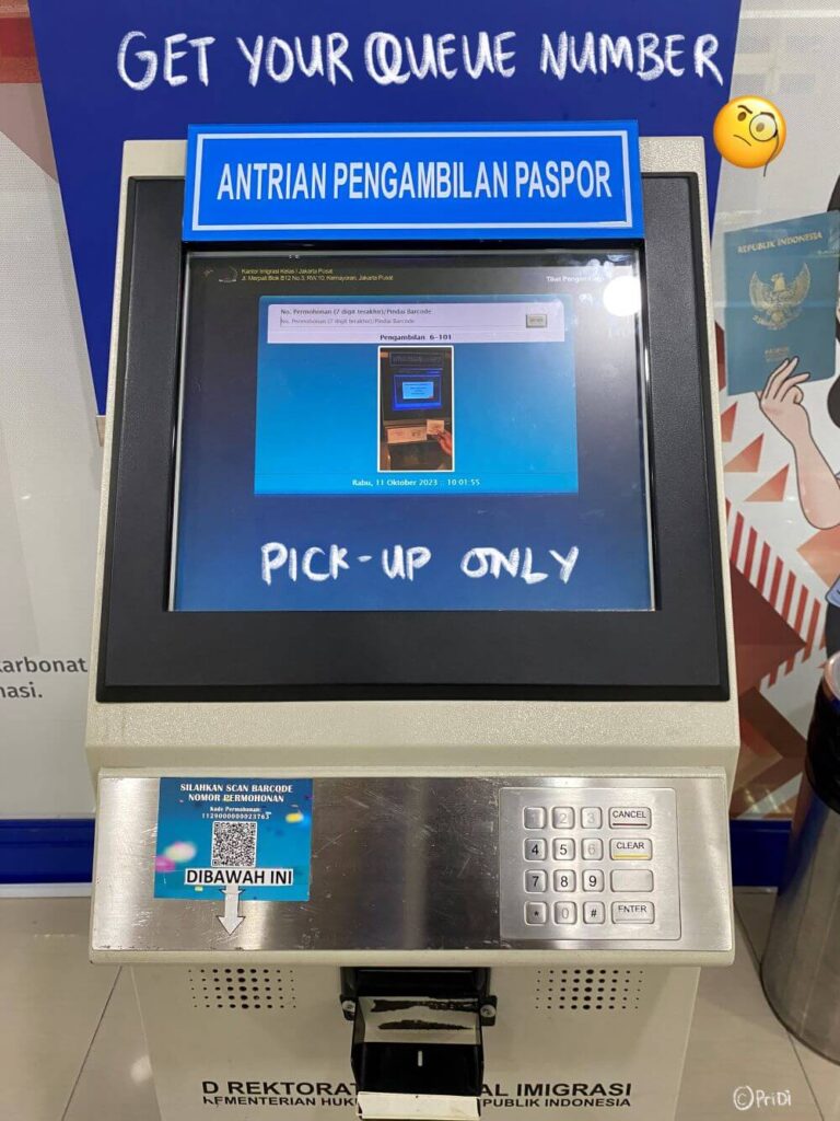 machine to pick up queue number at the Indonesian immigration office