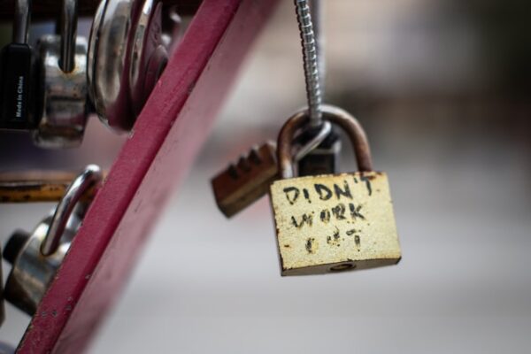 Love lock showing marker writing of "didn't work out"