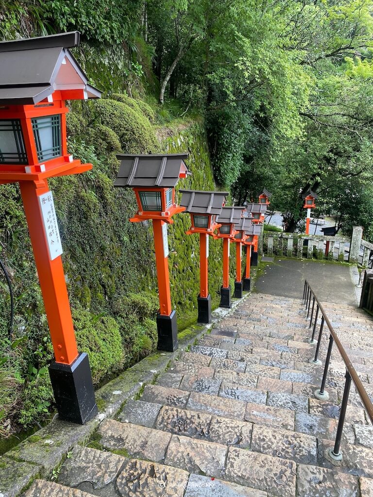 Stone steps leading down decorated with Japanese red lanterns