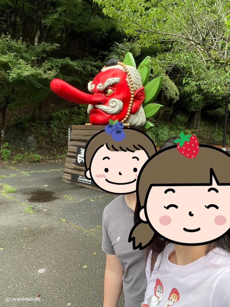 statue of Tengu head, a red skinned and long nosed Japanese supernatural creature