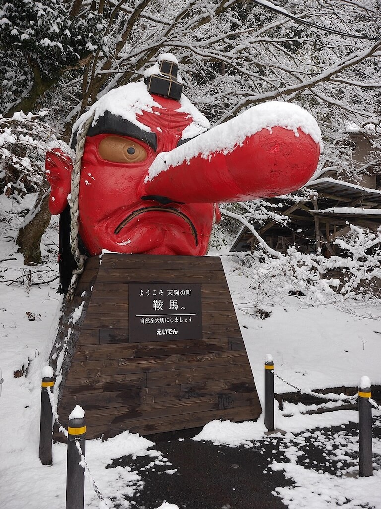 statue of Tengu head, a red skinned and long nosed Japanese supernatural creature