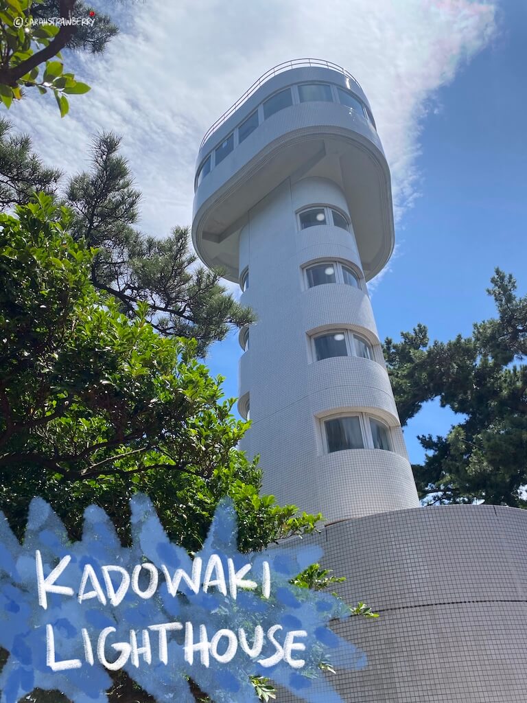 columnar lighthouse with triangle structure on top