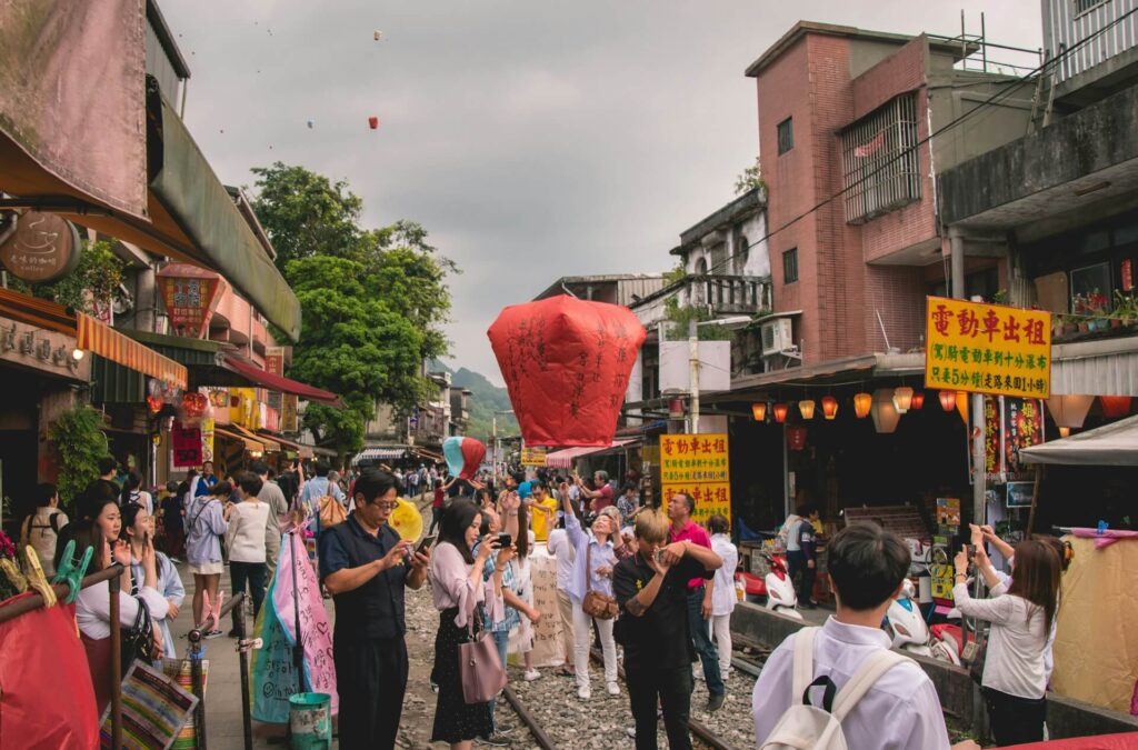 People flying wishing red lantern in Shifen Taiwan