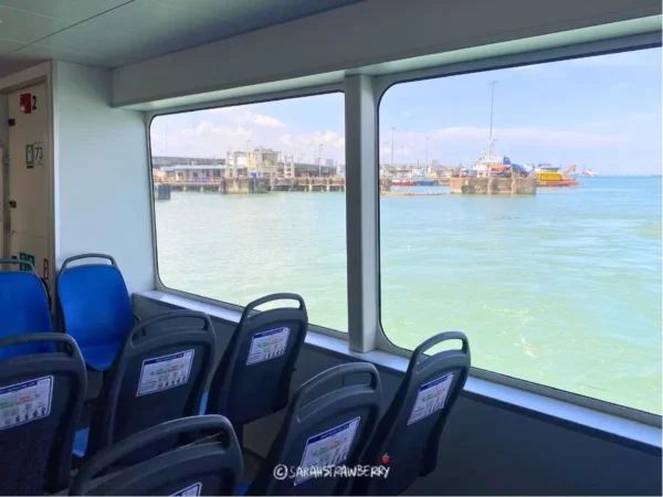 view of the sea from the inside of a ferry
