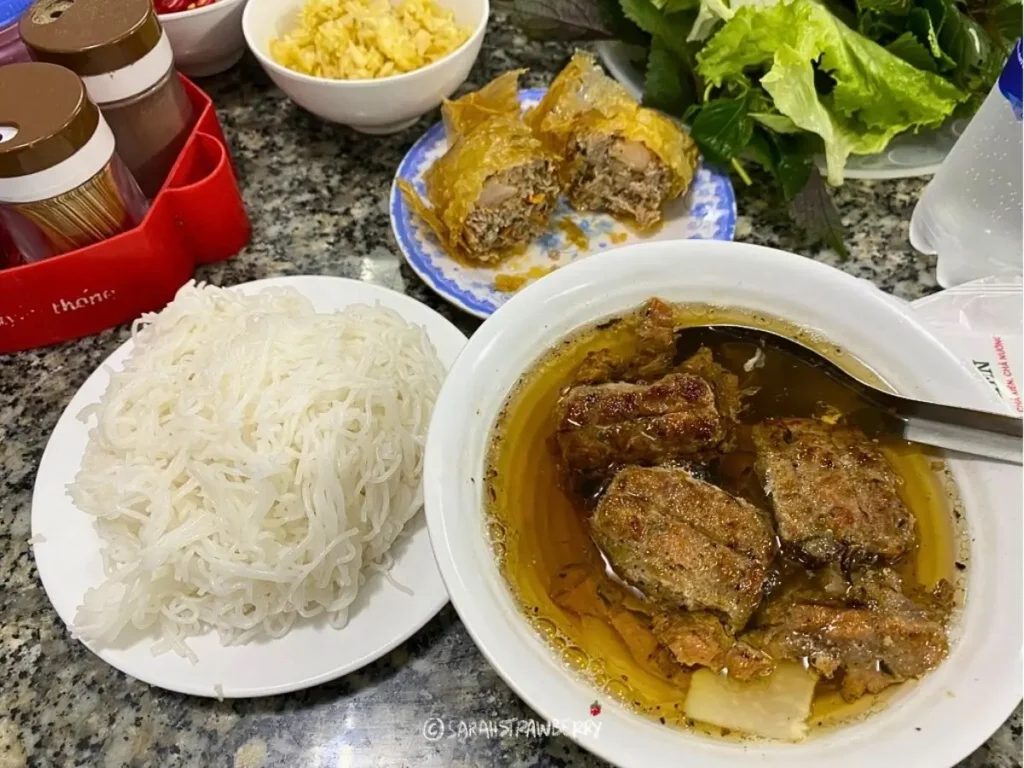Vietnamese Bun Cha and seafood spring roll at bun cha huong lien hanoi vietnam