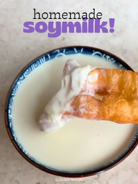Homemade soymilk with youtiao dipped into it (Chinese donut)